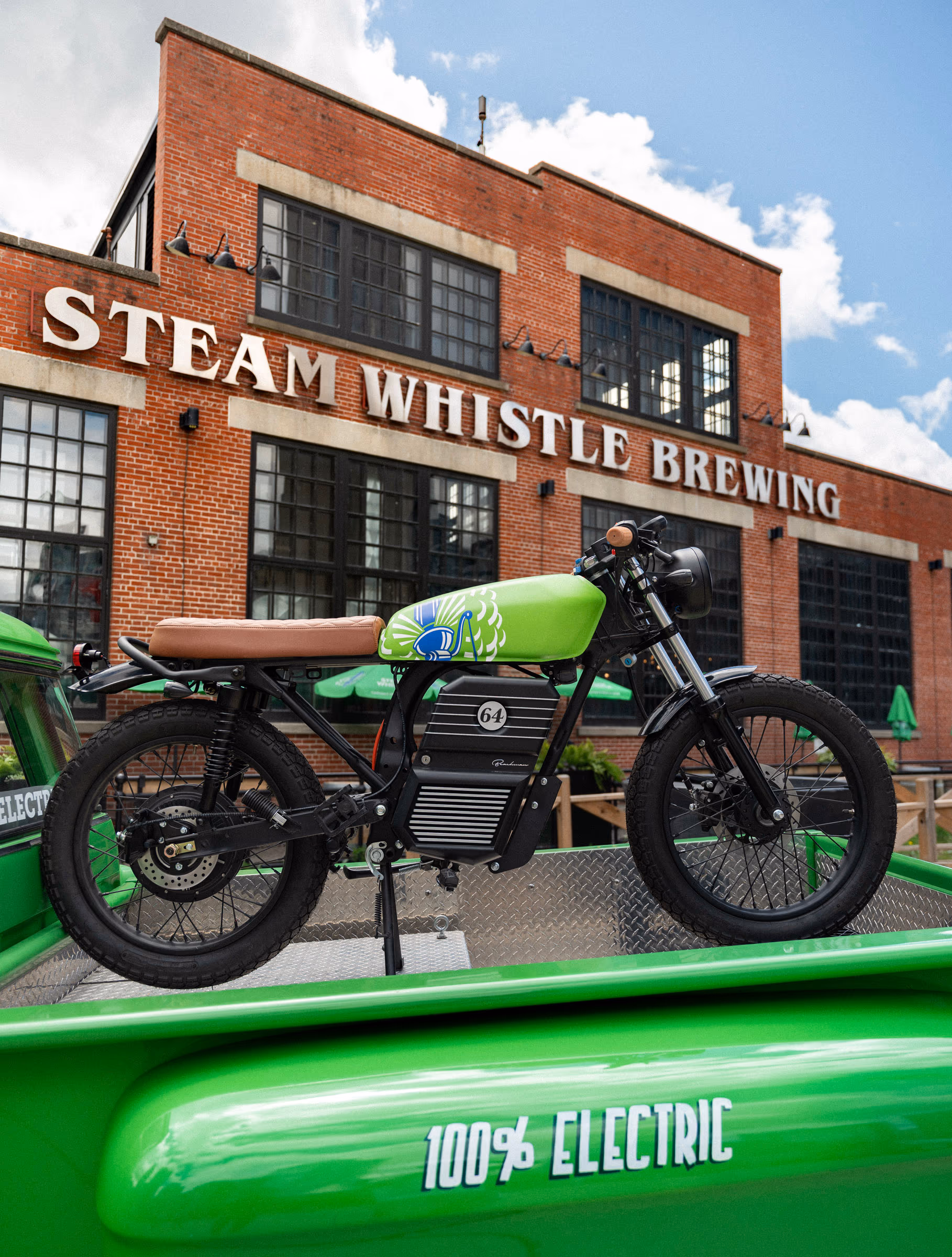 The Steam Whistle green Beachman outside the brewing roundhouse