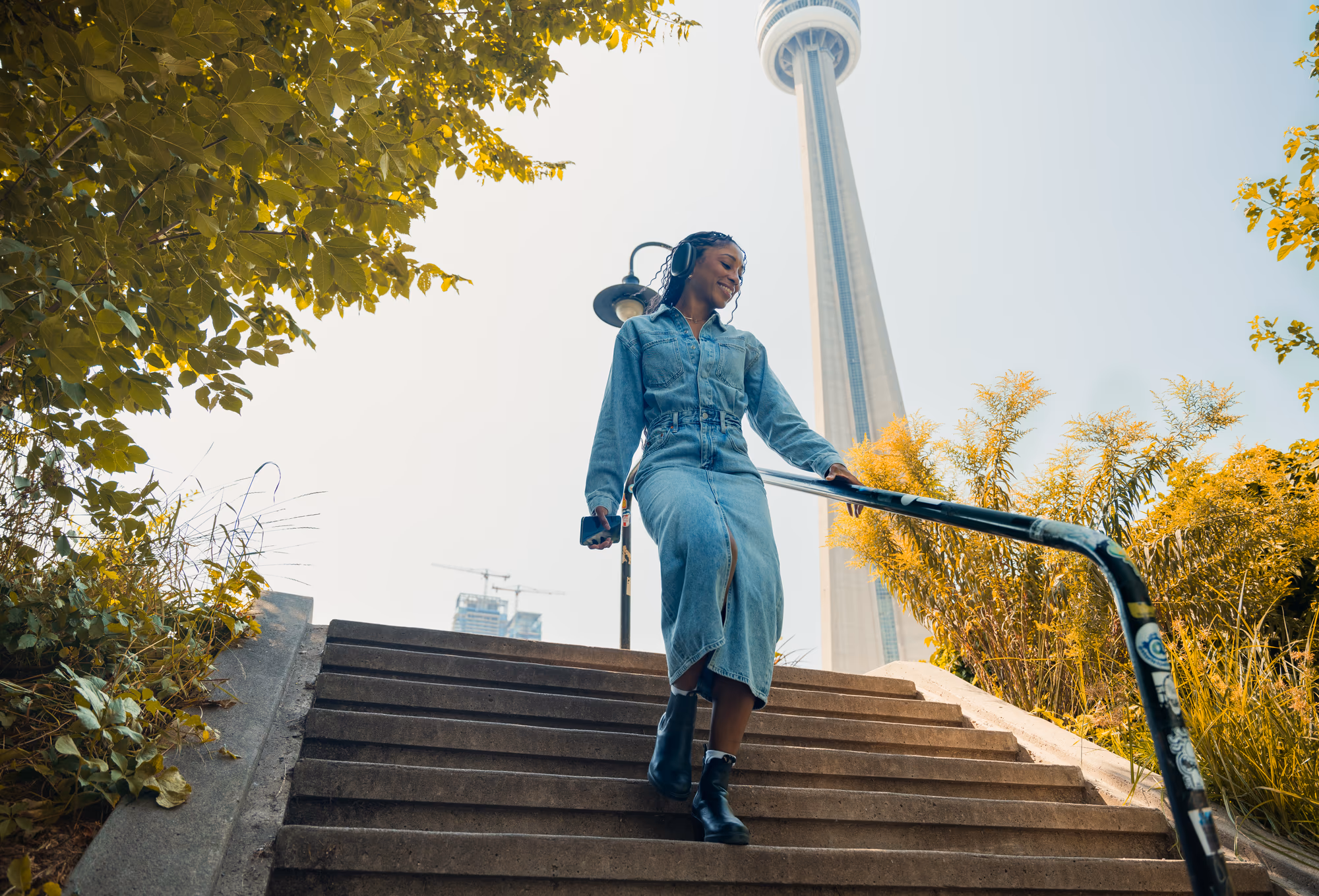 Descending the steps beneath the CN Tower in Blundstones