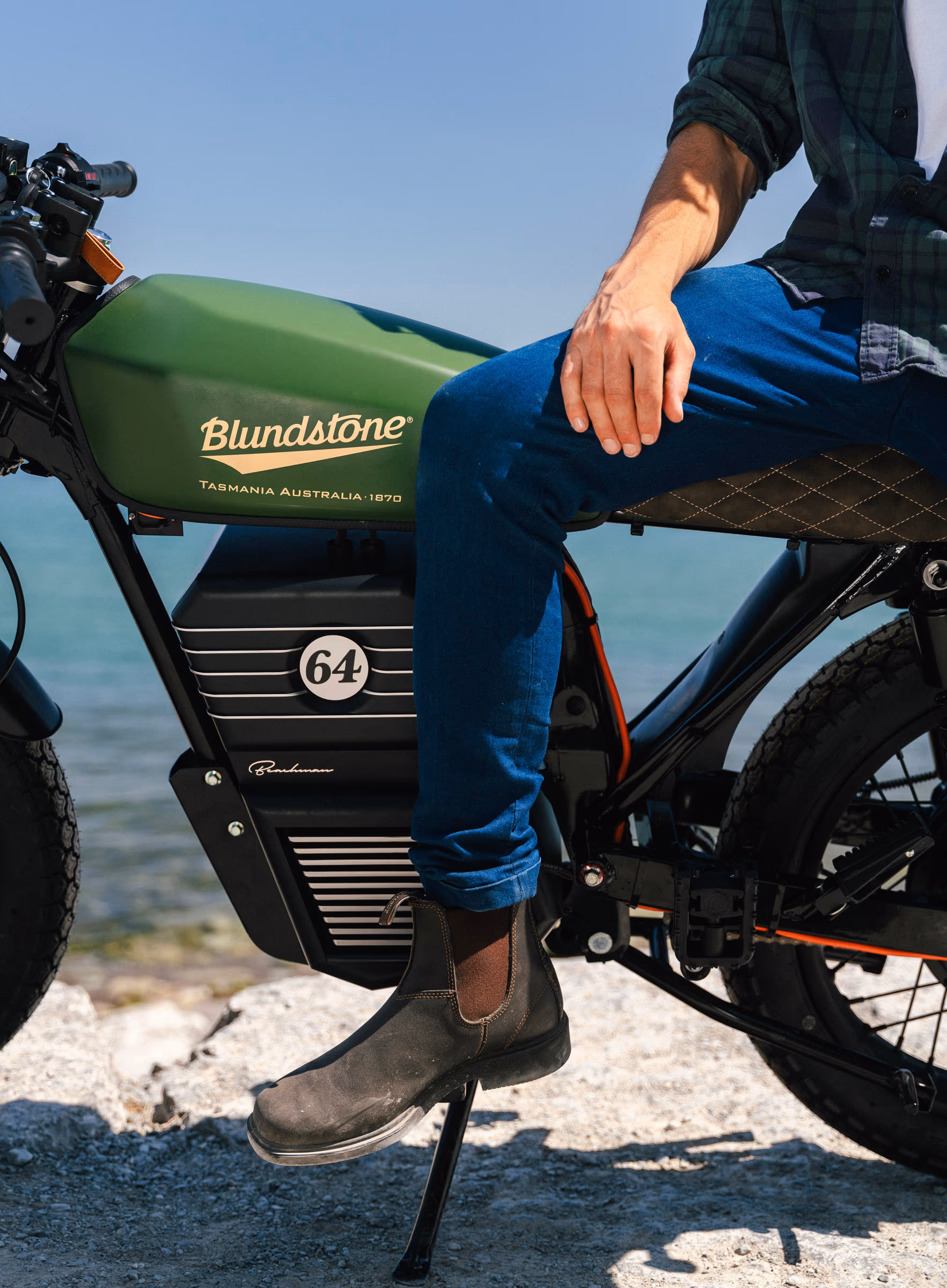 Blundstone boots against the Blundstone-liveried tank