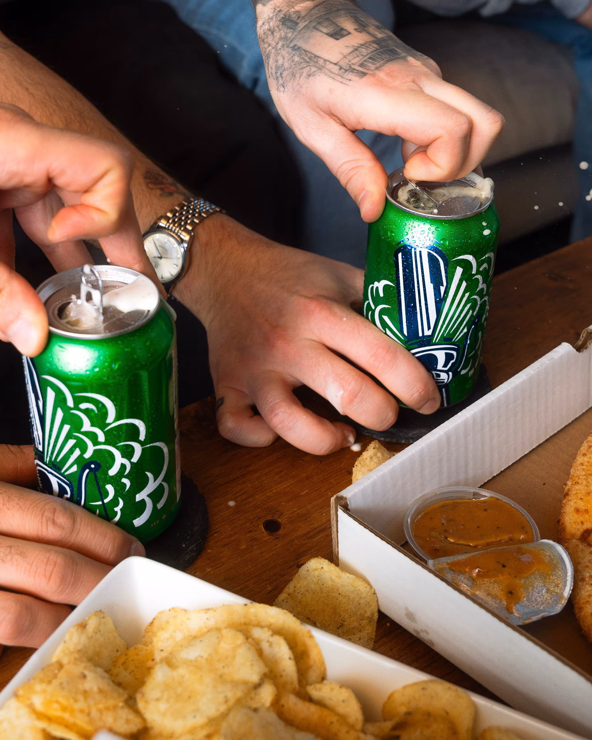 The 12-pack landing on the table mid-game