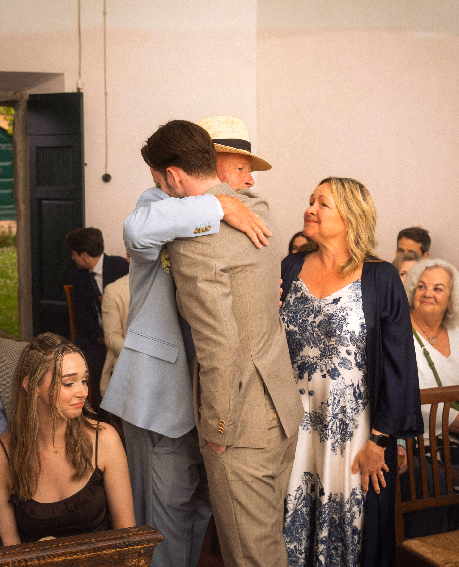 A long hug in the receiving line