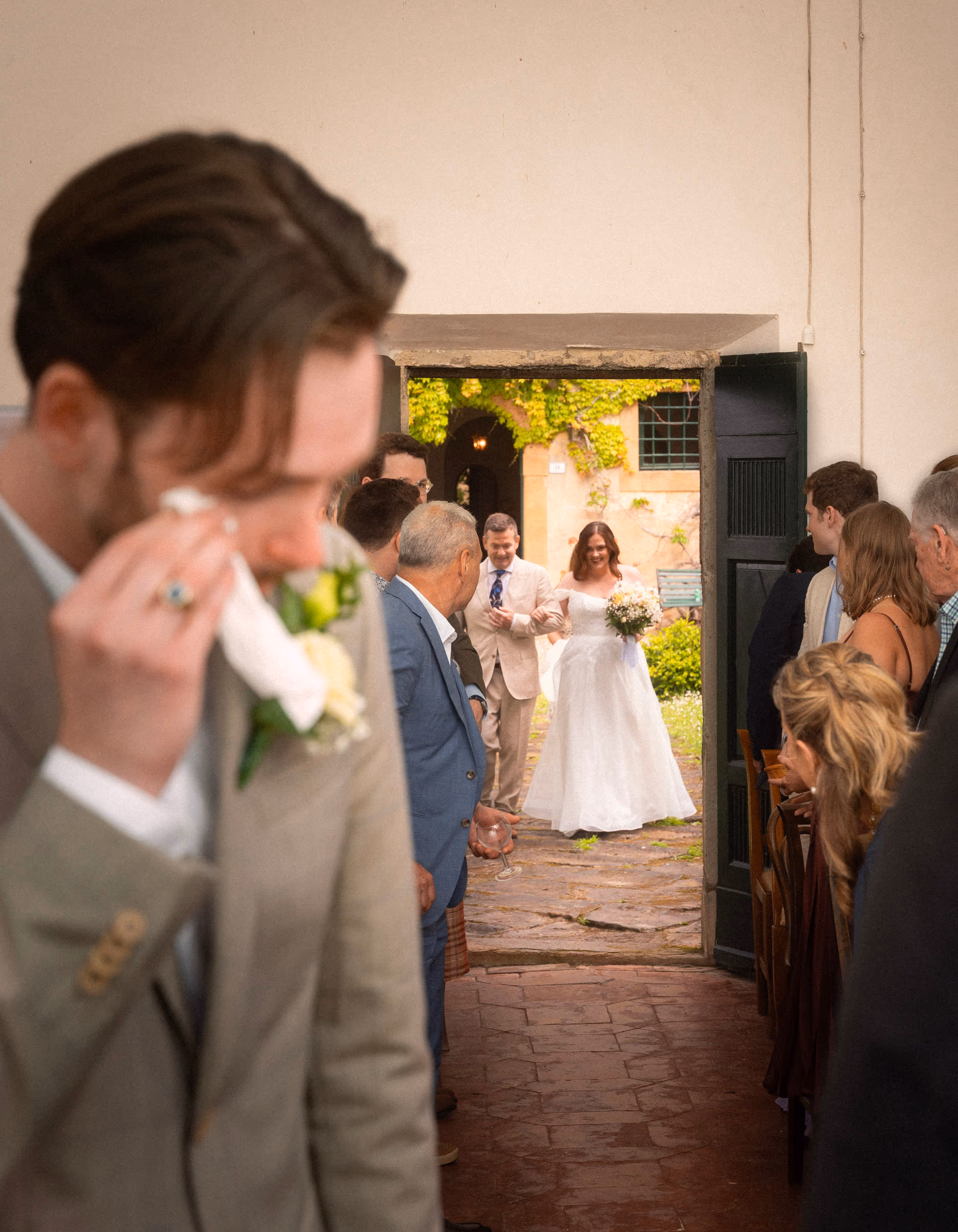 A quiet tear as the bride enters the ceremony