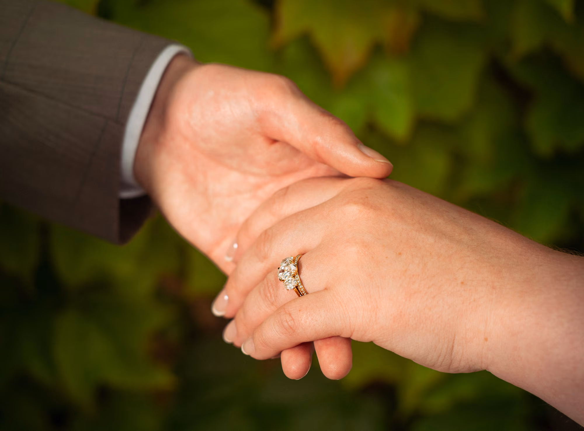 Her ring, their hands