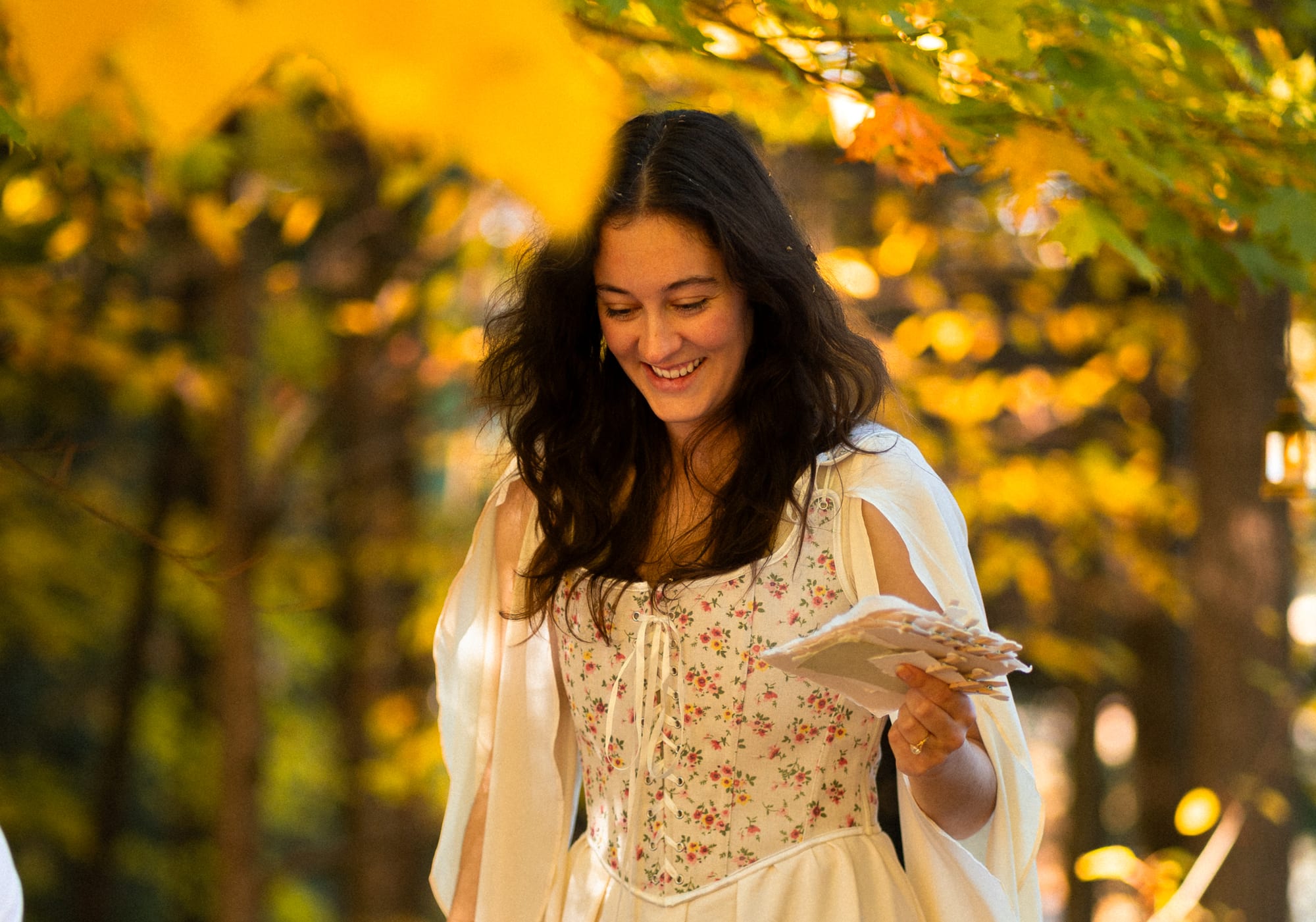 A couple framed by golden autumn foliage