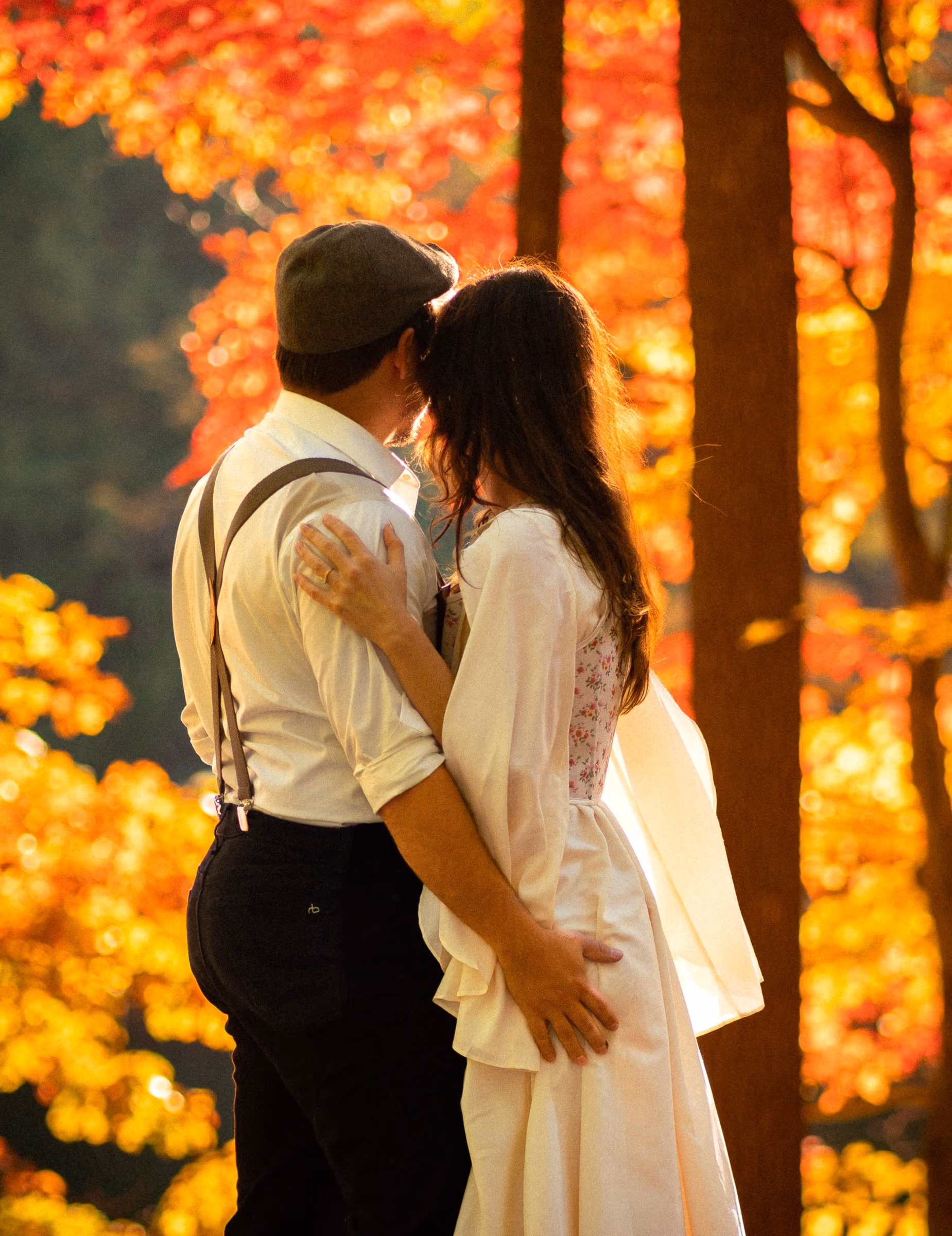 A close kiss beneath the canopy